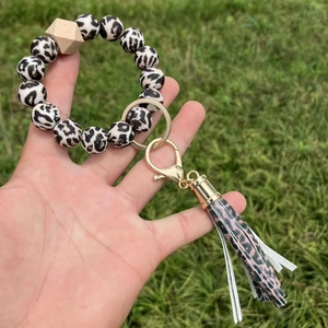 Silicone beaded bracelet keychain with sunflower leopard prints and stylish pink tassel