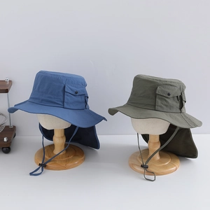 Detail of dry-fit sun hats with neck flaps and functional side pockets for hiking