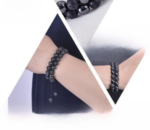 Close-up of double layer natural black lava and magnetic stone beaded bracelet for men