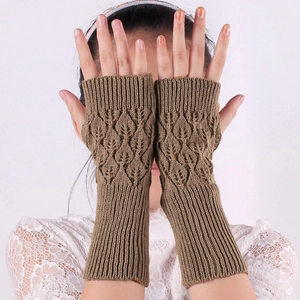 Brown knit fingerless gloves featuring an elegant hollow leaf pattern design