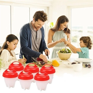 Set of six silicone egg cookers with red lids for family cooking in a bright kitchen