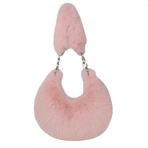 Pink plush crossbody bag with silver chain strap and fuzzy handle on white background