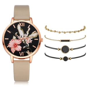 Women's rose gold watch set with flower dial, leather strap, and four fashion bracelets