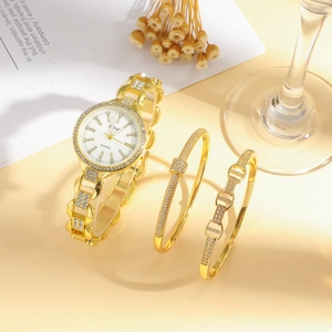 Women's gold quartz watch and rhinestone bracelet set with a sparkling white round dial