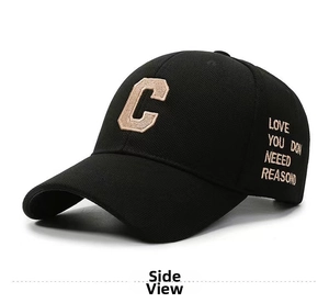 Detail view of black canvas baseball cap with C towel embroidery and side lettering