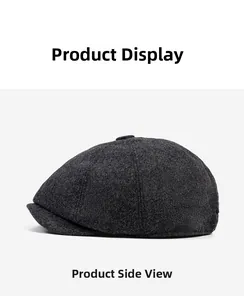 Side view of dark grey wool octagonal newsboy cap showing texture and panel details