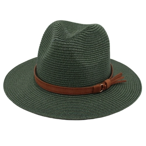 Classic green Panama straw hat with a brown leather band and fringe detailing