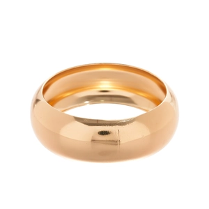Polished gold-tone wide dome bangle with minimalist metallic finish on white background
