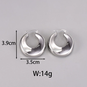 Detailed view of chunky silver C-shaped titanium steel earrings with 3.9cm height dimensions