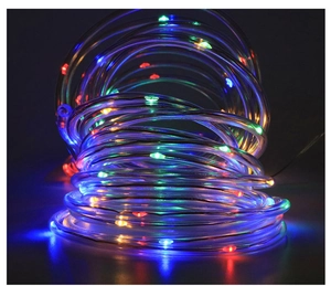 Macro detail of waterproof LED rope light with vibrant multicolor glowing fiber tube