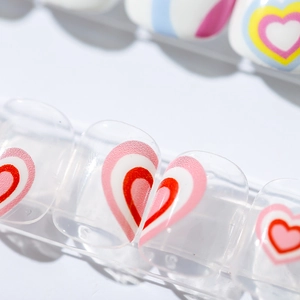 5D ultra-thin transparent press-on nails with red and pink layered heart patterns