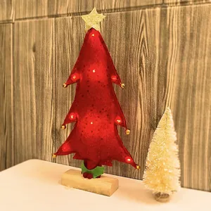 Mini red felt Christmas tree with LED lights, golden star topper and wooden base decor