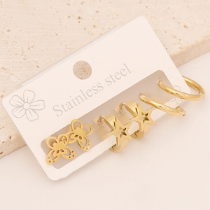 Three-piece gold stainless steel earring set featuring star, butterfly and hoop designs