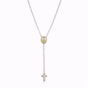 Detail of beaded rosary necklace with Virgin Mary medal and sparkling cross pendant