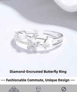 Macro view of adjustable silver butterfly ring with pavé-set zircon crystals