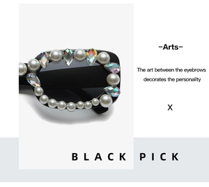 Close-up of square black sunglasses with inlaid pearls and colorful rhinestone details
