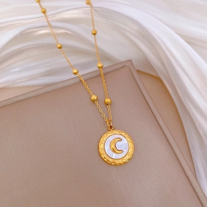 Gold titanium steel necklace featuring a round shell moon pendant on a beaded chain