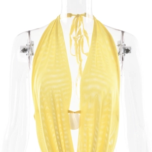 Detail of yellow mesh V-neck halter top with white shell decorative button accent