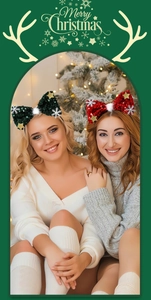 Women wearing festive Christmas headbands with sequins and bows near a tree