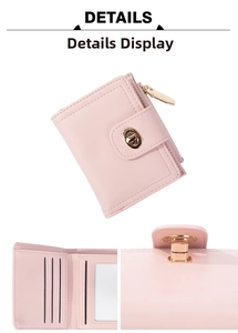 Detail of pink faux leather wallet showing card slots and metal twist lock closure