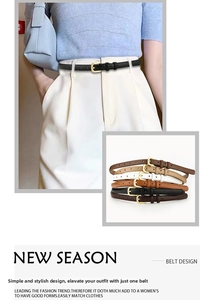 Close-up of thin leather belts for women with gold buckles in multiple stylish colors