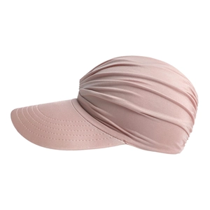 Detail of pink pleated sun visor hat showing reinforced stitching and satin texture
