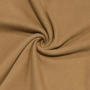 Macro shot of soft camel thermal fabric showing fine plush texture and material quality