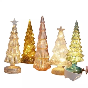 Detail of 5-piece LED Christmas tree light set in various colors on white background