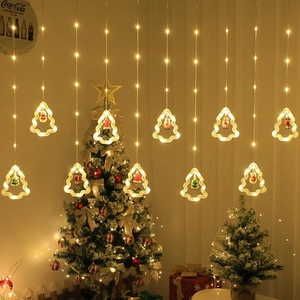 Christmas LED curtain lights with Santa and snowman figurines inside warm glowing tree shapes