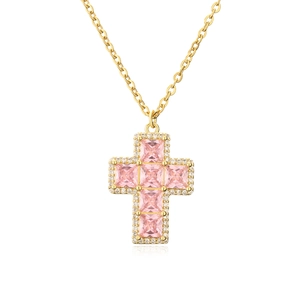 Detailed close-up of golden cross necklace featuring pink square stones and zircon stones