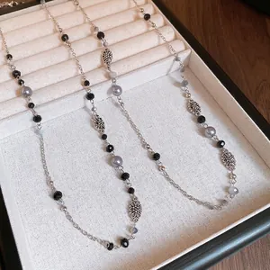 Elegant pearl and flower crystal sweater necklace in vintage silver finish for women
