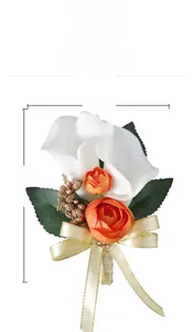 Wedding boutonniere with white calla lily and orange rose measuring 14cm x 10cm