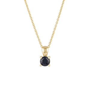 Macro shot of gold S925 sterling silver necklace with a round deep blue gemstone pendant