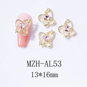 Macro view of gold heart planet nail charms with size 13x16mm for manicure decor