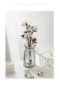 Minimalist grey ribbed glass vase with natural dried cotton stems for home decor