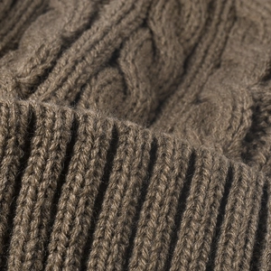 Winter fleece-lined cable knit hat featuring premium jacquard texture and ear protection