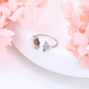 Detailed macro shot of S925 silver sunflower and bee open ring with yellow zircon
