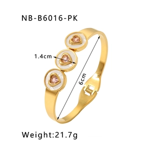 Detail of 18K gold heart bangle showing 6cm diameter and 21.7g product weight