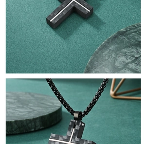 Macro shot of men's cross necklace with carbon fiber texture and silver metal inlay
