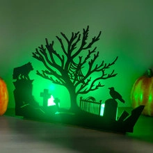 Detailed view of Halloween gnome skeleton magnets featuring a spooky silhouette and green backlight