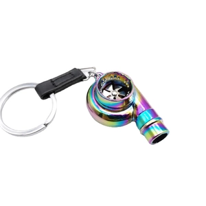 Rainbow car turbo keychain with rotating blades and black leather strap on white background