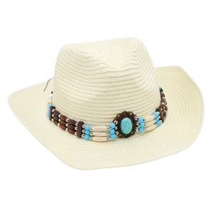 Close-up of weave texture and ethnic bead band with turquoise stone on cowboy sun hat