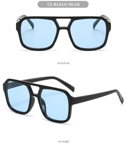 Classic double bridge aviator sunglasses with black frames and light blue tinted lenses
