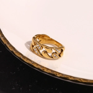 Close-up of 18K gold-plated stainless steel ring with water drop pattern and zircons