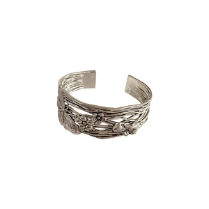 Vintage silver butterfly and floral cuff bracelet with a woven textured finish