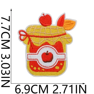 Detail of apple jam jar embroidered patch showing size measurements 7.7cm by 6.9cm