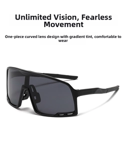 Detail of one-piece curved gradient lens on black frame cycling sports sunglasses