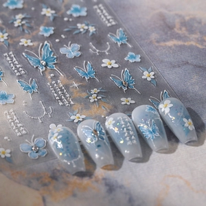 Elegant 5D embossed butterfly and flower nail stickers with blue relief art and glitter