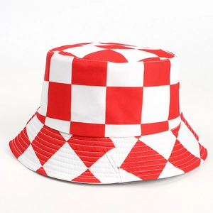 Detailed close-up of red and white checkerboard bucket hat with durable stitching