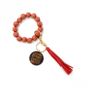Leopard print beaded wristlet keychain with red tassel and engraved MAMA wood charm